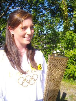 CARIAN SCUDAMORE ACTS AS TORCH BEARER